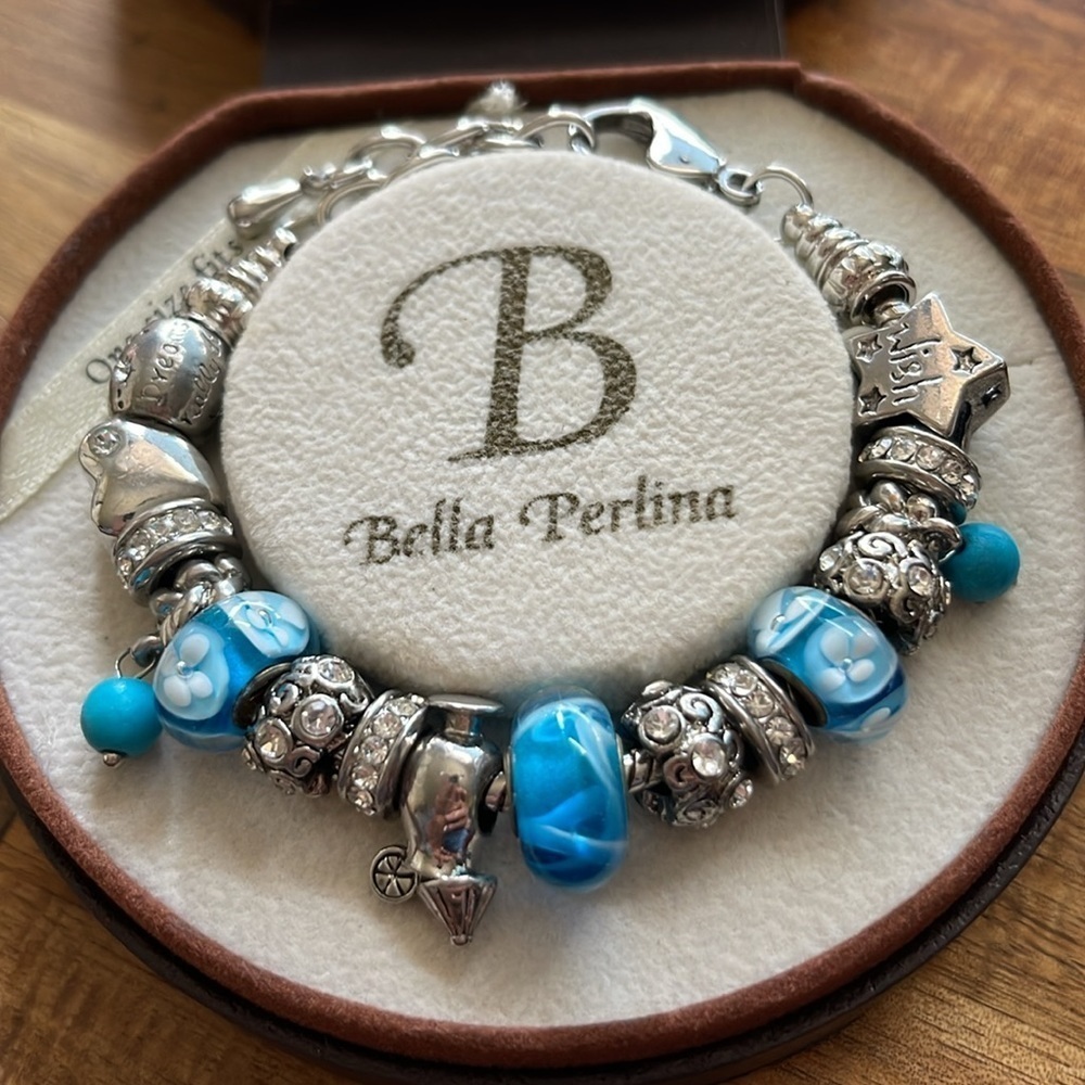 Bella Perlina Silvertone & Blue Charm Bracelet. P/A